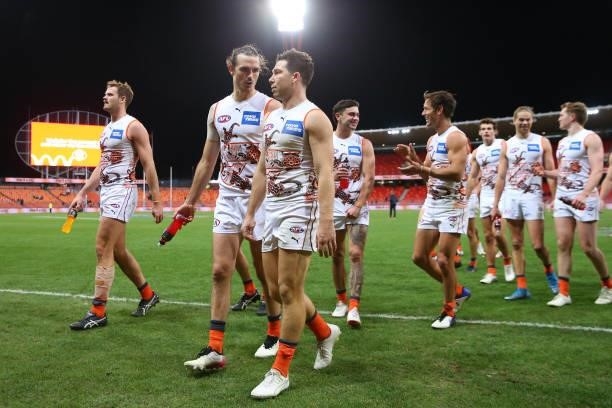 Phil Davis of the Giants and Toby Greene of the Giants celebrate victory during the round 14 AFL match between the Greater Western Sydney Giants and...