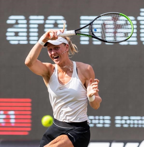 Liudmila Samsonova of Russia hits a forehand against Victoria Azarenka of Belarus in the women's singles semifinal match during day 8 of the...