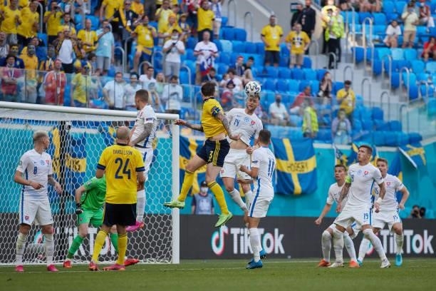 Milan Skriniar of Slovakia wins the header before Victor Lindelof of Sweden during the UEFA Euro 2020 Championship Group E match between Sweden and...