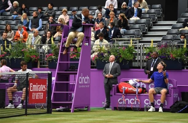Denis Shapovalov of Canada has a heated discussion with the chair umpire Carlos Bernardes during his Semi-final match against Cameron Norrie of Great...