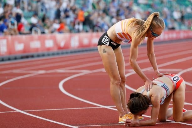 Abbey Cooper and Rachel Schneider react after running in the first round of the Women's 5000 Meter during day one of the 2020 U.S. Olympic Track &...