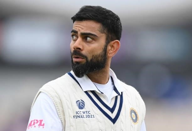 Virat Kohli of India leaves the field for bad light during Day 2 of the ICC World Test Championship Final between India and New Zealand at the...