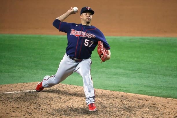 Hansel Robles of the Minnesota Twins pitches against the Texas Rangers during the ninth inning at Globe Life Field on June 18, 2021 in Arlington,...