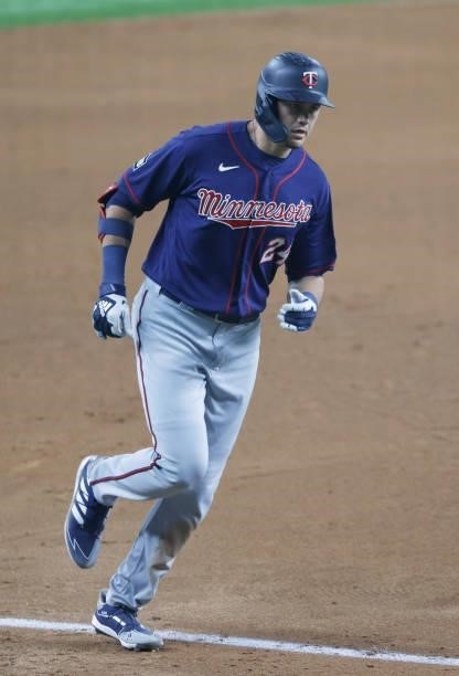 Trevor Larnach of the Minnesota Twins runs the bases after hitting a solo home run against the Texas Rangers during the fifth inning at Globe Life...