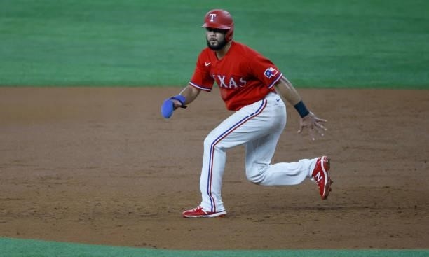 Isiah Kiner-Falefa of the Texas Rangers takes a lead from first base against the Minnesota Twins during the second inning at Globe Life Field on June...