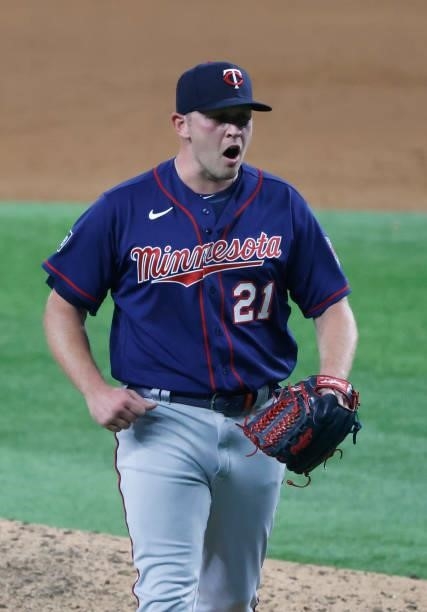 Tyler Duffey of the Minnesota Twins reacts after striking out Eli White of the Texas Rangers to end the game in the tenth inning at Globe Life Field...