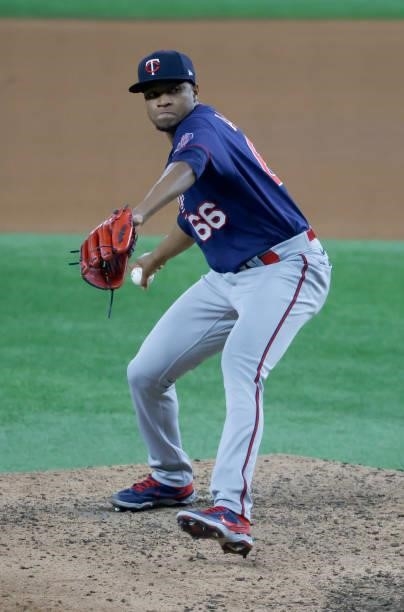 Jorge Alcala of the Minnesota Twins pitches against the Texas Rangers during the seventh inningat Globe Life Field on June 18, 2021 in Arlington,...