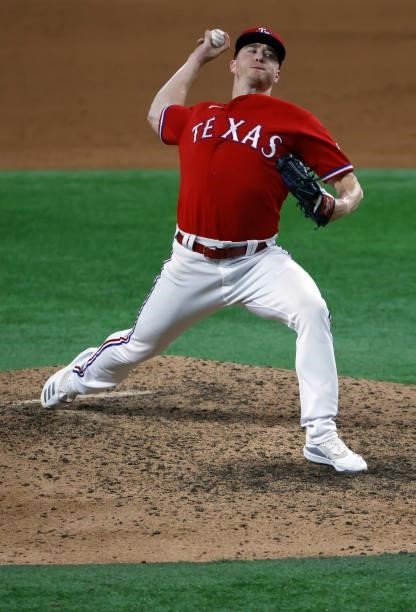 Josh Frasier of the Texas Rangers pitches against the Minnesota Twins during the tenth inning at Globe Life Field on June 18, 2021 in Arlington,...