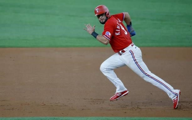 Isiah Kiner-Falefa of the Texas Rangers rum to second base against the Minnesota Twins during the second inning at Globe Life Field on June 18, 2021...