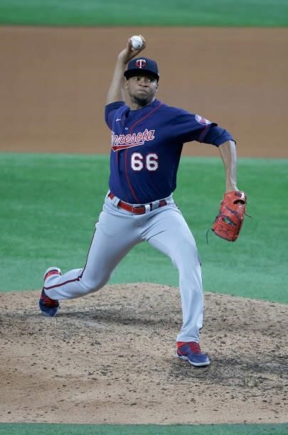 Jorge Alcala of the Minnesota Twins pitches against the Texas Rangers during the seventh inningat Globe Life Field on June 18, 2021 in Arlington,...