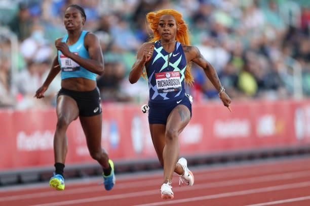 Sha'Carri Richardson runs as she competes in the first round of the Women's 100 Meter during day one of the 2020 U.S. Olympic Track & Field Team...