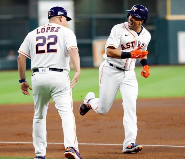 Michael Brantley of the Houston Astros hits a three run home run in the first inning against the Chicago White Soxat Minute Maid Park on June 17,...