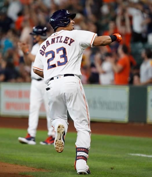 Michael Brantley of the Houston Astros hits a three run home run in the first inning against the Chicago White Soxat Minute Maid Park on June 17,...
