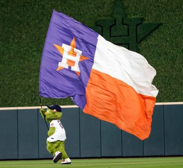 Houston Astros mascot Orbit celebrates a win against the Chicago White Sox at Minute Maid Park on June 17, 2021 in Houston, Texas.