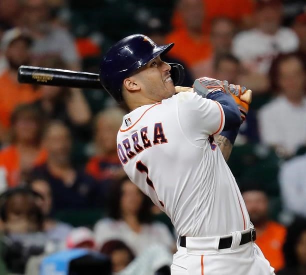 Carlos Correa of the Houston Astros pops out against the Chicago White Sox at Minute Maid Park on June 17, 2021 in Houston, Texas.