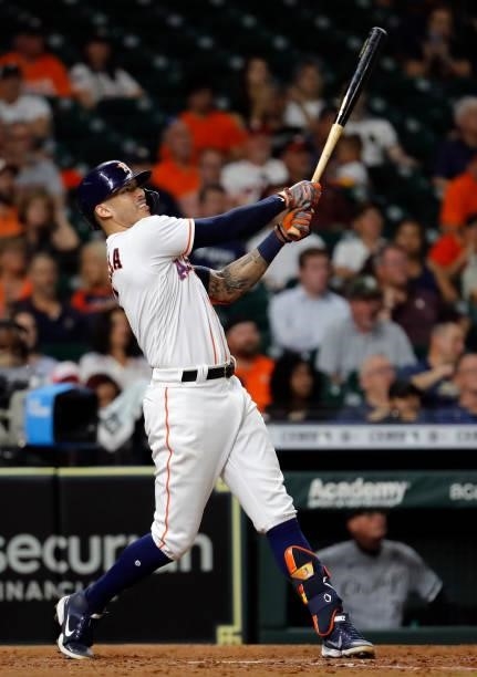 Carlos Correa of the Houston Astros pops out against the Chicago White Sox at Minute Maid Park on June 17, 2021 in Houston, Texas.