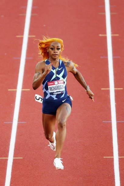 Sha'Carri Richardson competes in the first round of the Women's 100 Meter during day one of the 2020 U.S. Olympic Track & Field Team Trials at...