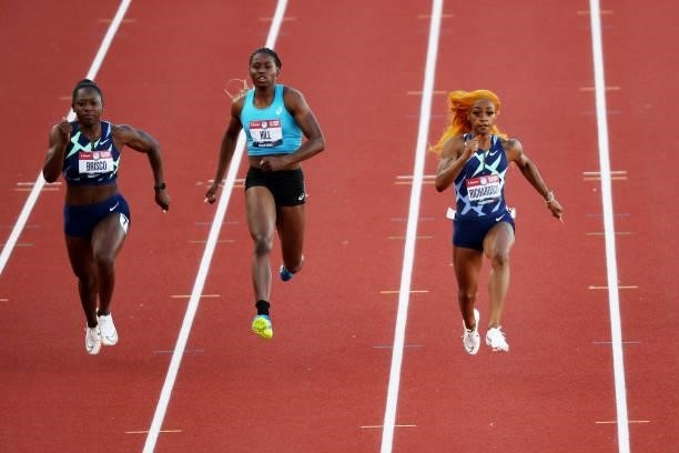 Sha'Carri Richardson competes in the first round of the Women's 100 Meter during day one of the 2020 U.S. Olympic Track & Field Team Trials at...