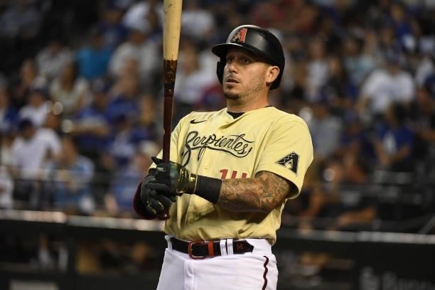 Asdrubal Cabrera of the Arizona Diamondbacks gets ready to step into the batters box against the Los Angeles Dodgers at Chase Field on June 18, 2021...