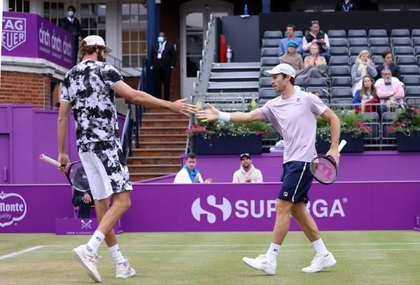 Reilly Opelka of USA and John Peers of Australia fist pump during their Semi-final match against Alex de Minaur of Australia and Cameron Norrie of...