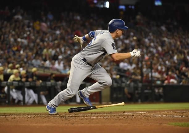 Will Smith of the Los Angeles Dodgers follows through on a swing against the Arizona Diamondbacks at Chase Field on June 18, 2021 in Phoenix, Arizona.