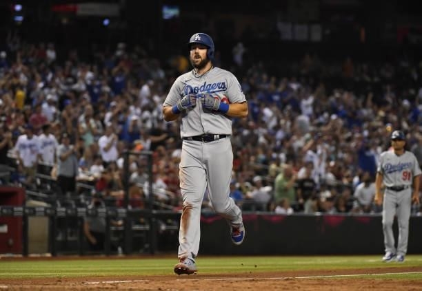 Steven Souza of the Los Angeles Dodgers rounds the bases after hitting a solo home run off of Joe Mantiply of the Arizona Diamondbacks during the...
