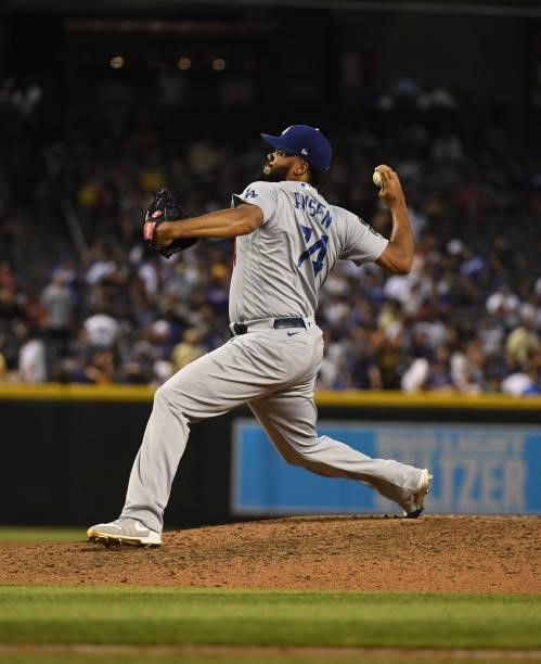 Kenley Jansen of the Los Angeles Dodgers delivers a ninth inning pitch against the Arizona Diamondbacks at Chase Field on June 18, 2021 in Phoenix,...