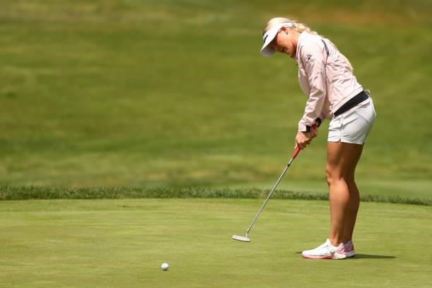 Charley Hull of England putts for birdie on the 15th green during round three of the Meijer LPGA Classic for Simply Give at Blythefield Country Club...