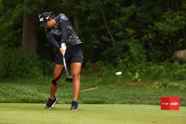 Mina Harigae hits her drive on the 16th hole during round three of the Meijer LPGA Classic for Simply Give at Blythefield Country Club on June 19,...