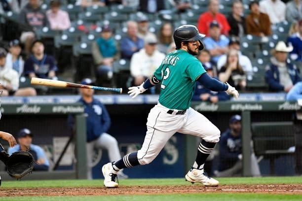 Luis Torrens of the Seattle Mariners runs to first base during the game against the Tampa Bay Rays at T-Mobile Park on June 18, 2021 in Seattle,...