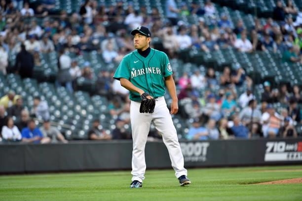 Yusei Kikuchi of the Seattle Mariners stands on the field during the game against the Tampa Bay Rays at T-Mobile Park on June 18, 2021 in Seattle,...