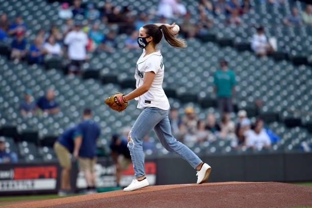 The ceremonial first pitch is thrown by Katie Thurston of ABC's Bachelorette before the game between the Seattle Mariners and the Tampa Bay Rays at...