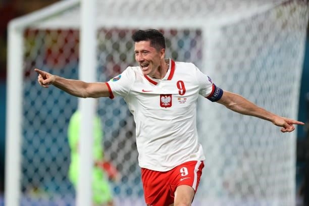 Robert Lewandowski of Poland celebrates scoring his team´s first goal goal during the UEFA Euro 2020 Championship Group E match between Spain and...