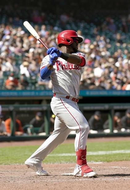 Odubel Herrera of the Philadelphia Phillies hits a sacrifice fly scoring Alec Bohm in the top of the seventh inning of the game against the San...