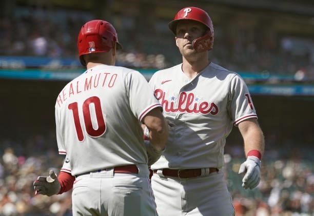 Rhys Hoskins of the Philadelphia Phillies is congratulated by J.T. Realmuto after Hoskins hit a three-run home run against the San Francisco Giants...