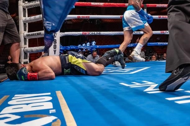 Gabe Rosado punches Bektemir Melikuziev and knocks him out in a surprising upset at Don Haskins Center on June 19, 2021 in El Paso, Texas.