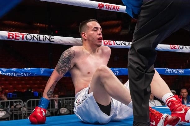 Gabriel Gutierrez tries to get up after being knocked out by Jousce Gonzalez at Don Haskins Center on June 19, 2021 in El Paso, Texas.