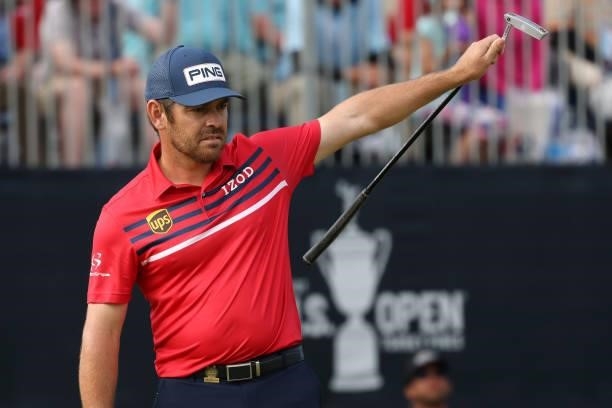 Louis Oosthuizen of South Africa celebrates making a long putt for eagle on the 18th green during the third round of the 2021 U.S. Open at Torrey...