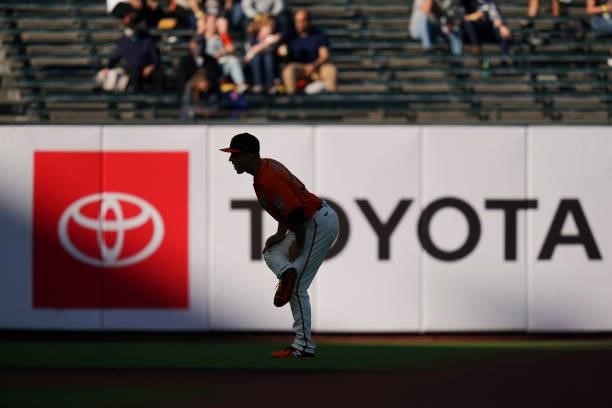 Jason Vosler of the San Francisco Giants stretches prior to the first inning against the Philadelphia Phillies at Oracle Park on June 18, 2021 in San...