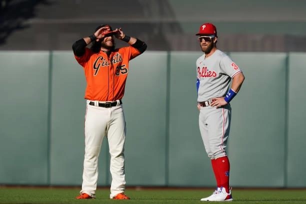 Brandon Crawford of the San Francisco Giants and Bryce Harper of the Philadelphia Phillies shake hands prior to the first inning at Oracle Park on...