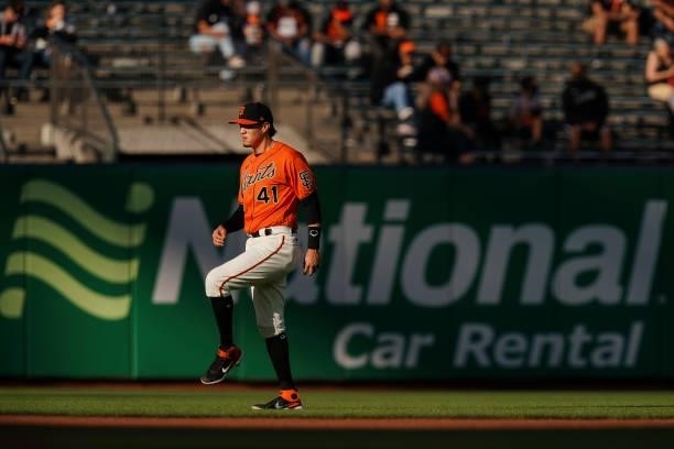 Wilmer Flores of the San Francisco Giants warms up prior to the first inning against the Philadelphia Phillies at Oracle Park on June 18, 2021 in San...