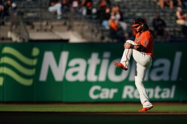 Brandon Crawford of the San Francisco Giants warms up prior to the first inning against the Philadelphia Phillies at Oracle Park on June 18, 2021 in...