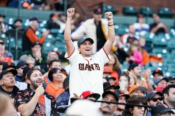 Fan celebrates after watching a proposal during the game between the San Francisco Giants and the Philadelphia Phillies at Oracle Park on June 18,...