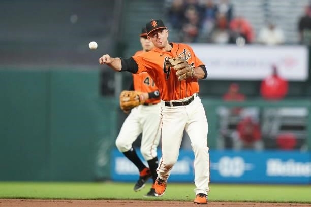 Jason Vosler of the San Francisco Giants fields the ball against the Philadelphia Phillies at Oracle Park on June 18, 2021 in San Francisco,...