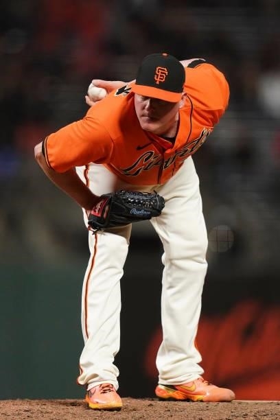 Jake McGee of the San Francisco Giants pitches against the Philadelphia Phillies at Oracle Park on June 18, 2021 in San Francisco, California.