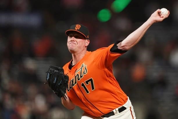 Jake McGee of the San Francisco Giants pitches against the Philadelphia Phillies at Oracle Park on June 18, 2021 in San Francisco, California.