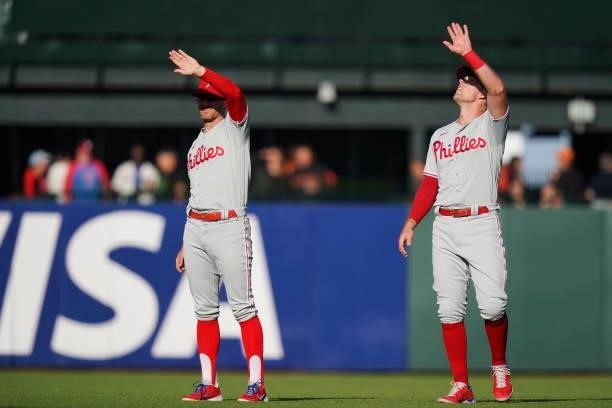 Brad Miller of the Philadelphia Phillies and Rhys Hoskins look around the stadium prior to the first inning against the San Francisco Giants at...