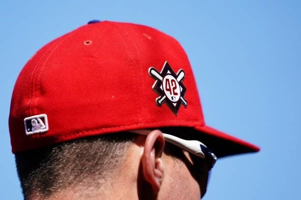 Close up view of a Philadelphia Phillies hat with a Jackie Robinson pin prior to the game against the San Francisco Giants at Oracle Park on June 18,...