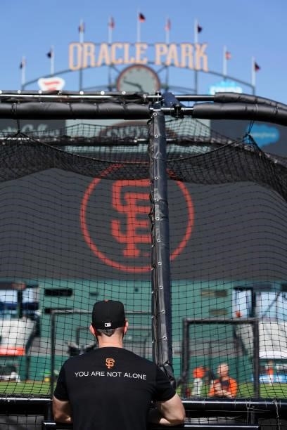 Member of the San Francisco Giants looks on during batting practice prior to the game against the Philadelphia Phillies at Oracle Park on June 18,...