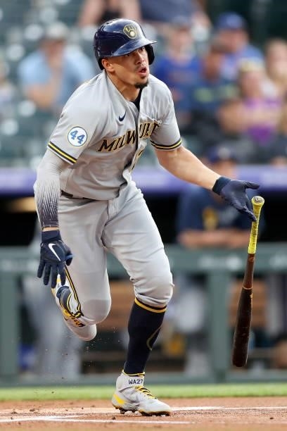 Willy Adames of the Milwaukee Brewers hits a RBI double against the Colorado Rockies in the first inning at Coors Field on June 19, 2021 in Denver,...